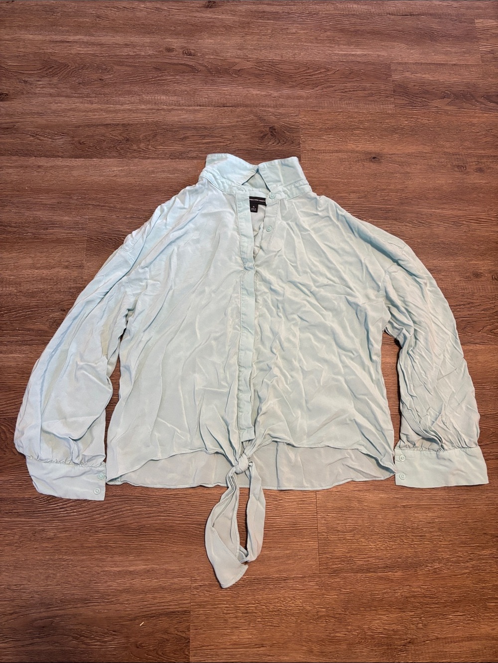 women’s blue button down blouse
